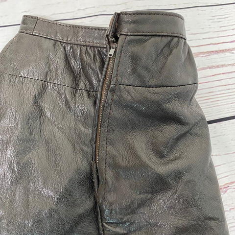 Mini jupe en cuir.TFT vVntage shop