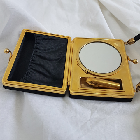 Minaudière noire en métal doré