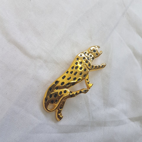 Broche léopard en métal doré